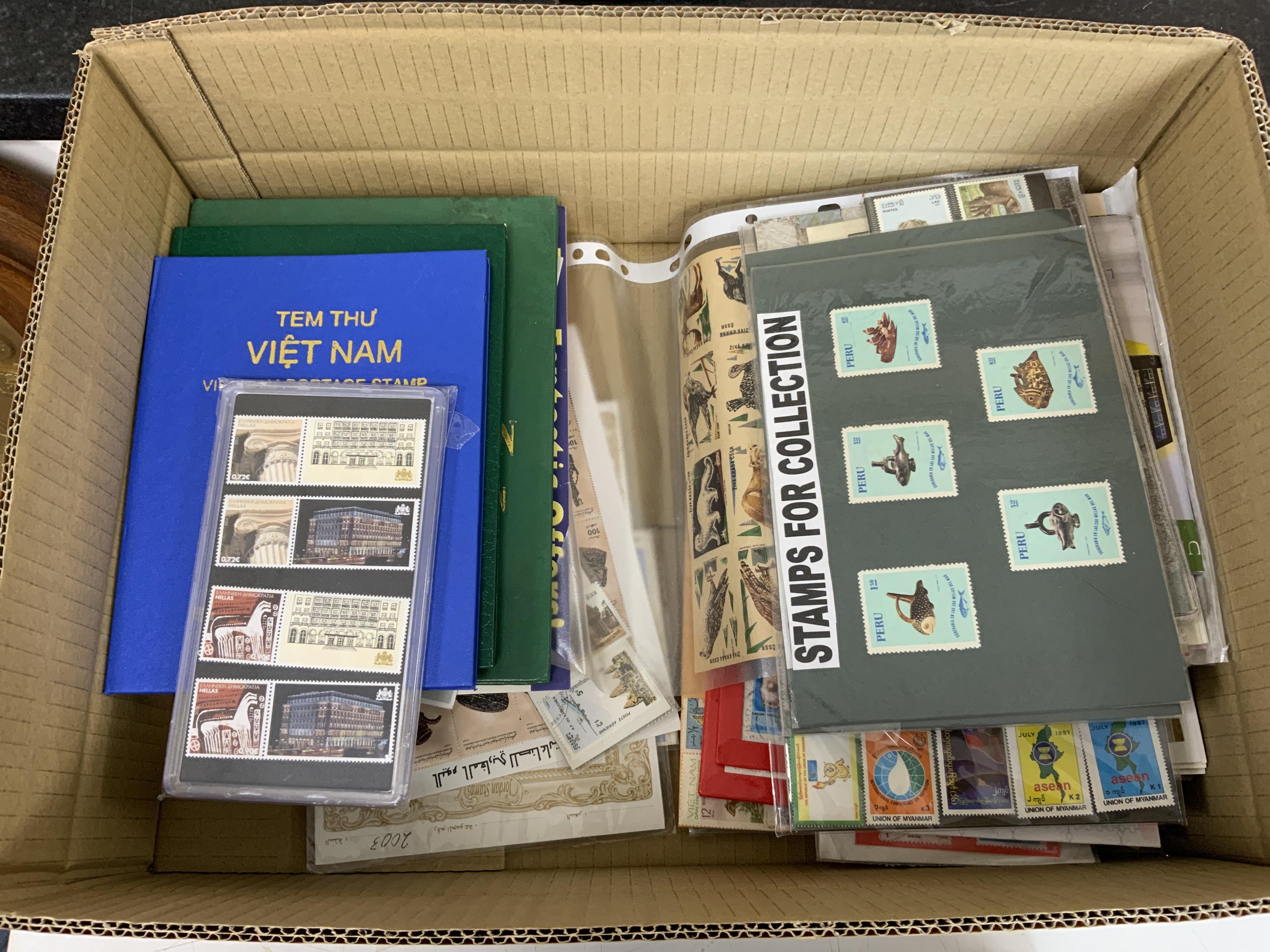 A collection of world stamps including two case selections of stamps in individual perspective cases from the Philatelic Legends ‘Historic Stamps’ collection, including Vichy France, US Civil War, the Cape triangle stamp